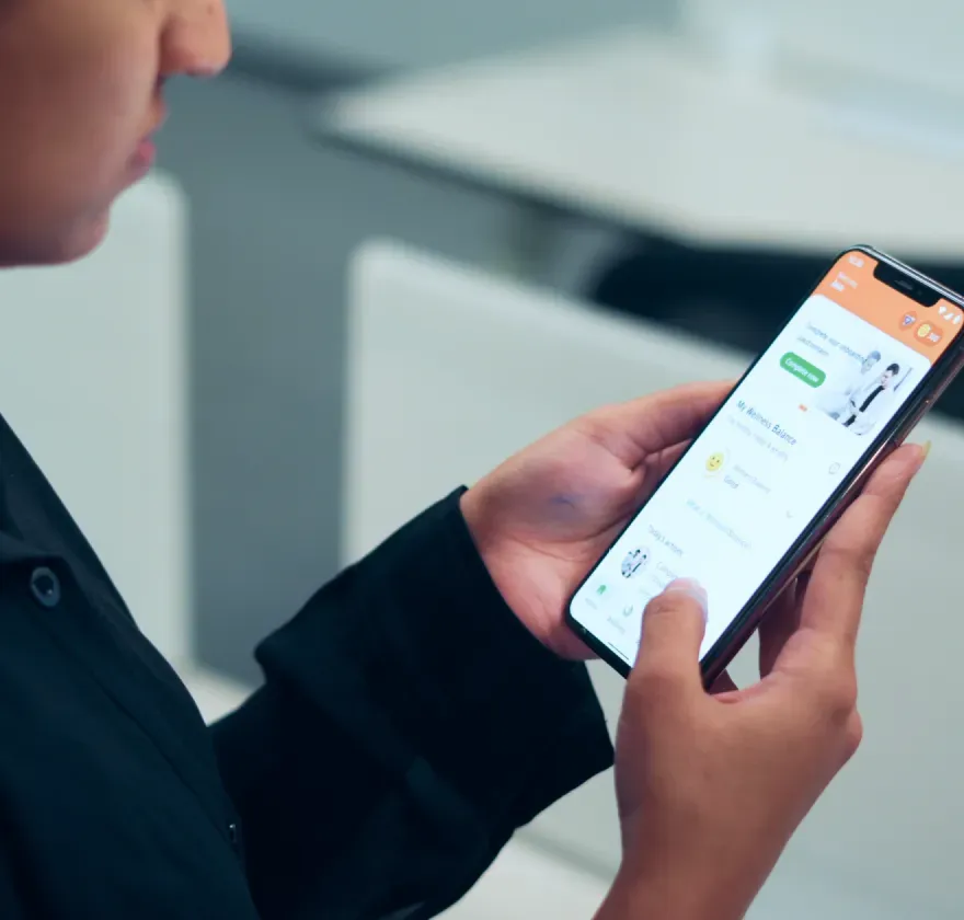 Fully App Testing User testing the Fully wellness app on a smartphone during the product UX research process.