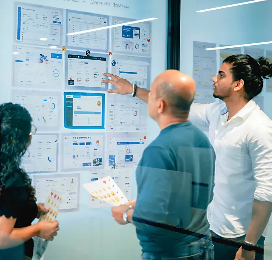 Prudential Financial Screens Review Spinach team reviewing customer journey maps and interface flows for the Prudential Financial insurance experience design.